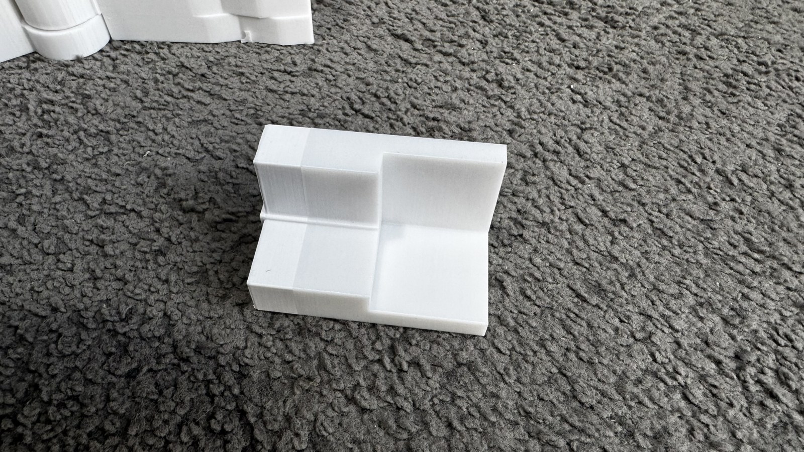 Pieza blanca de encuentro fabricada mediante impresión 3D