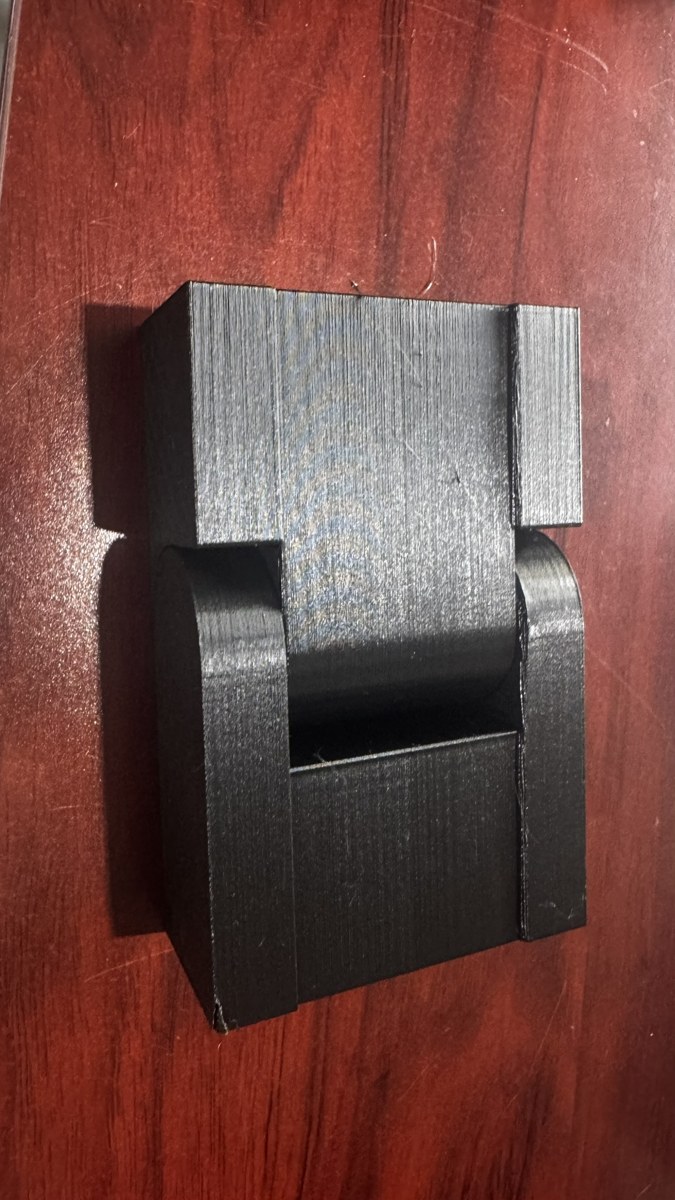 Detalle de una pieza negra de impresión 3D